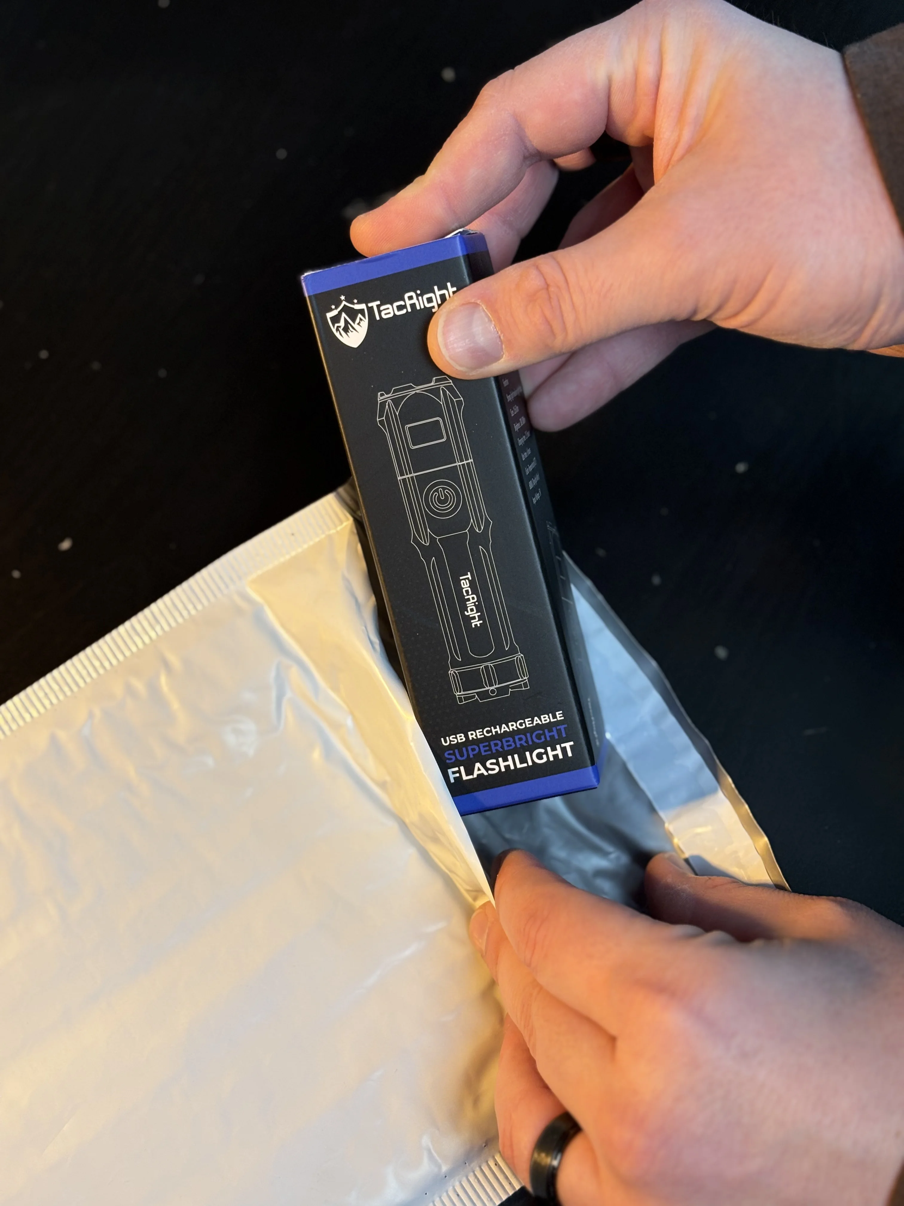 USB Flashlight clipped to bag